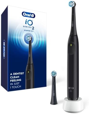 Oral-B Rechargeable Electric Toothbrush, iO2 Starter Kit, 3 Cleaning Modes, Automatic Pressure Sensor to Protect Gums, 2 Brush Heads, Night Black